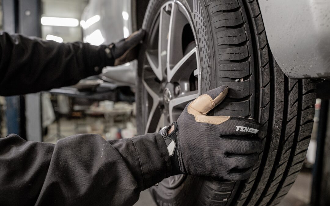 Mechanic checking the wheel